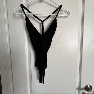 Black ribbed vneck body suit.